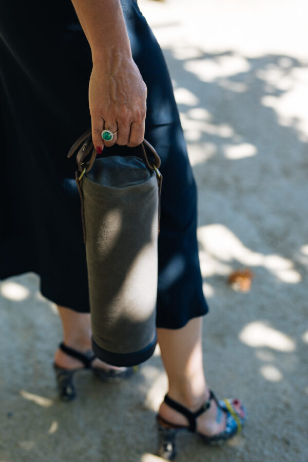 Woman carrying Vinarmour wine travel bag
